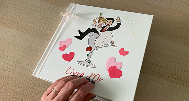 graphiste mariage à Reims - Design de la couverture du livre d’or, avec l’illustration du faire-part, menu…